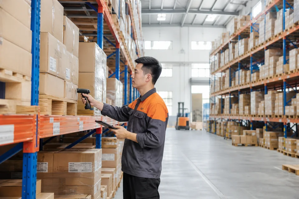 Warehouse worker scanning ecommerce inventory in China